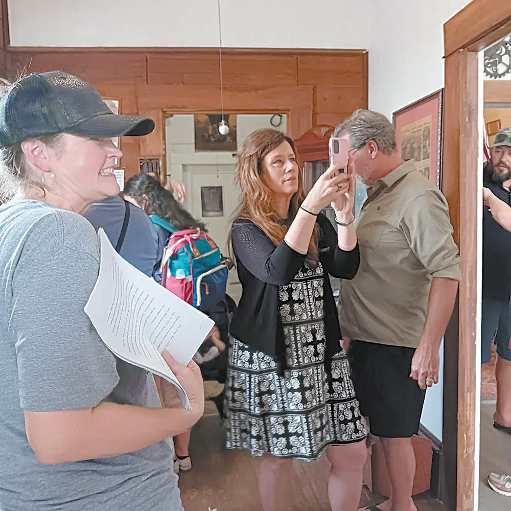 Members of the Ware family explore the Stockdale Historical Museum with museum President Kassie Dixon (left), during a May 17 family reunion tour to Stockdale, the home of one of Texas’ early female physicians, Dr. Ella Ware. COURTESY/Judy Akin Childress